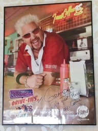 Signed Guy Poster inside the Diner