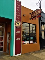 Out Front of Tails & Trotters