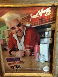 Triple D poster at Texas Pride BBQ