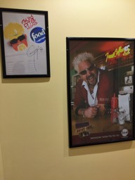 Guy Ate Here Tag & Triple D Poster at The Magnolia Pancake Haus