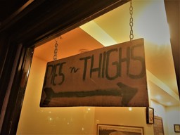 The high end sign in the window at Pies n Thighs