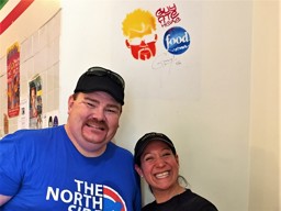 Guy ate Here sign with Owner Catalina Canales at Tortilla Cafe
