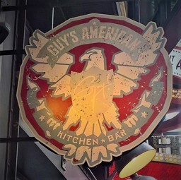 Sign above the door at Guys in NYC
