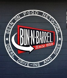 Dinner's Logo on wall out back at Bun n Barrel