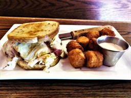 The Bombshell Sandwich with Tavern Tots at Higland Tavern