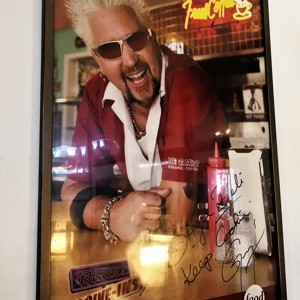 Triple D poster up at The Bagel Deli