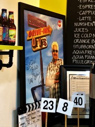 Triple D Poster behind the register - Se7en Bites in Orlando, Fl