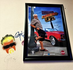 Guy Ate Here & Triple D poster at Sabroso!