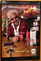 Triple D poster inside Otto's Sausage Kitchen