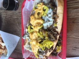 Philly Cheesesteak with peppers,onions,mushrooms, banana peppers provolone and wiz