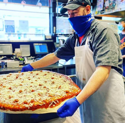 Now that is the biggest pizza I have ever seen