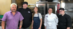 photo with Guy Fieri from their website