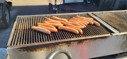 Hot Links on the grill at Ray Ray's Hog Pit Food Truck