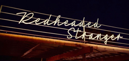 the redheaded stranger logo out front