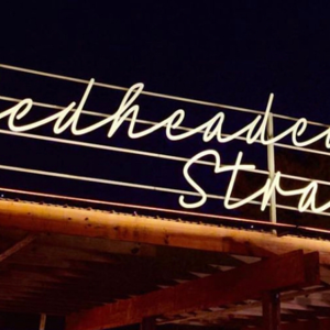 the redheaded stranger logo out front
