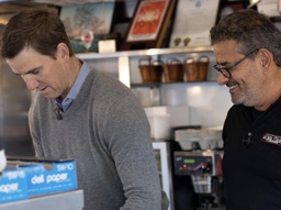 even eli manning was caught cooking behind the grill
