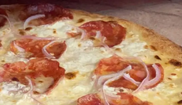 little bit of red onion on your pizza
