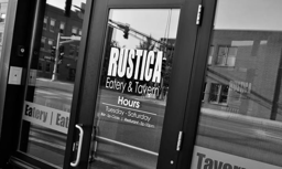 rustica logo on the door