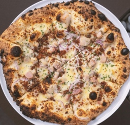 Pork Belly Pizza comes with the Charcuterie Board