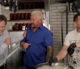 Guy Fieri hanging out in the kitchen