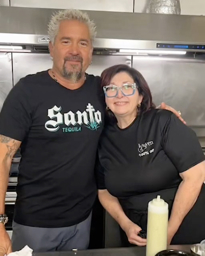 me and guy fieri posing for a pic