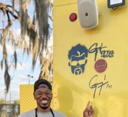 guy fieri signature on the food truck