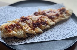 good looking haddock fried to perfection with sichuan pepper, chili crisp, tare
