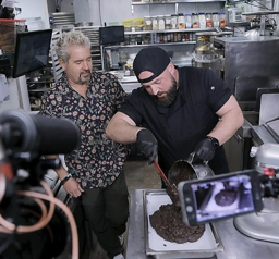 Guy Fieri hamming it up behind the camera