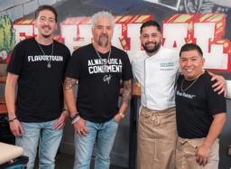 group pic with guy fieri and family