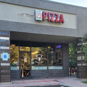 Smiling with Hope Pizza Outside View